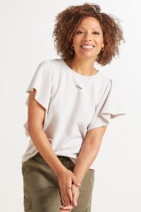 woman in short sleeve shirt.