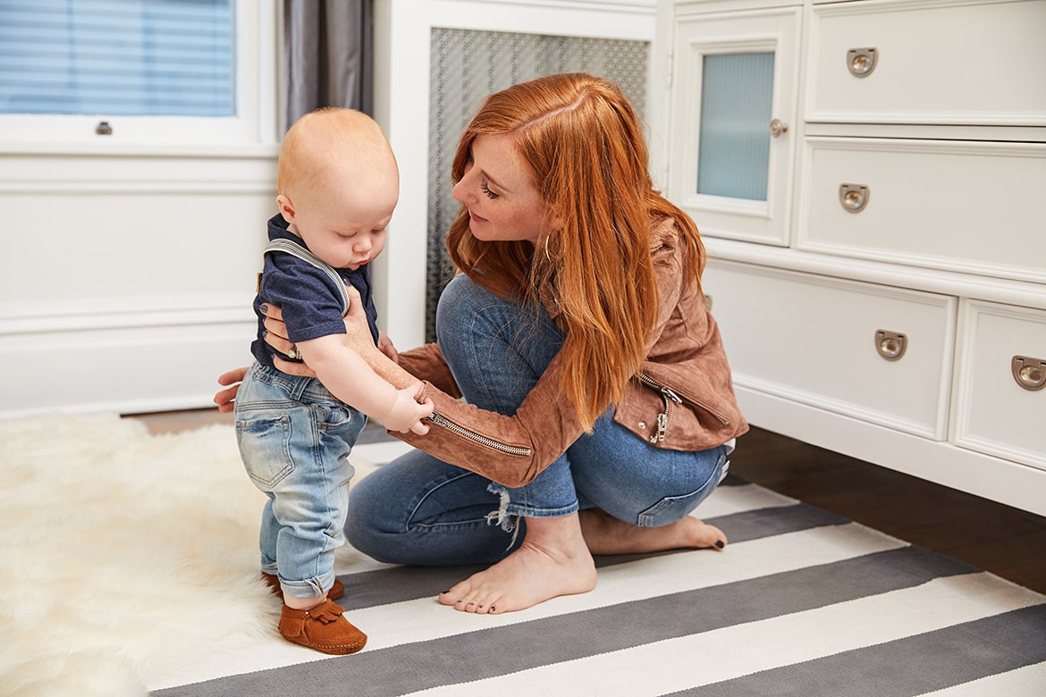 mom and son in nursery