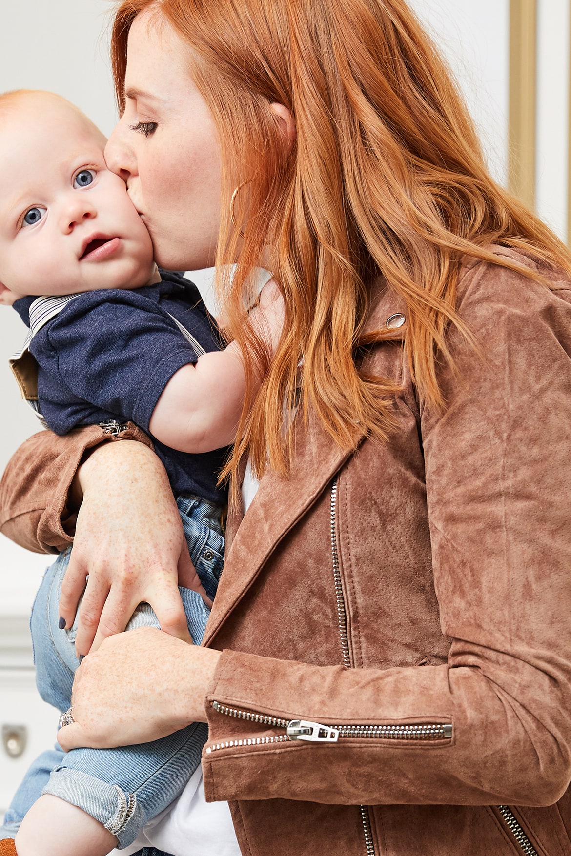 mom kissing son