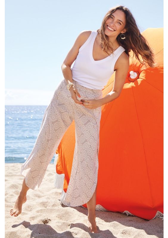 woman standing on beach.