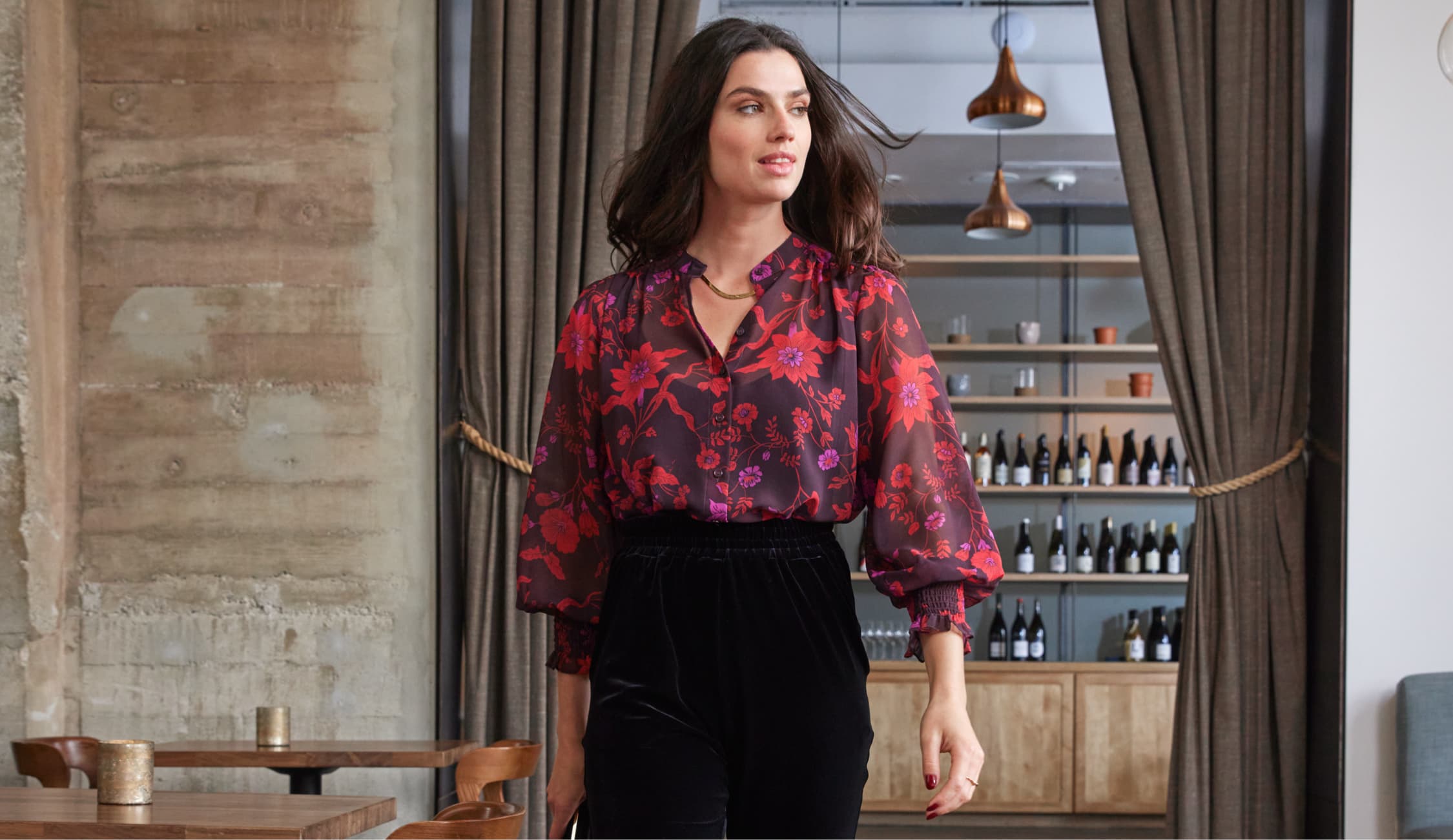 woman wearing red blouse.