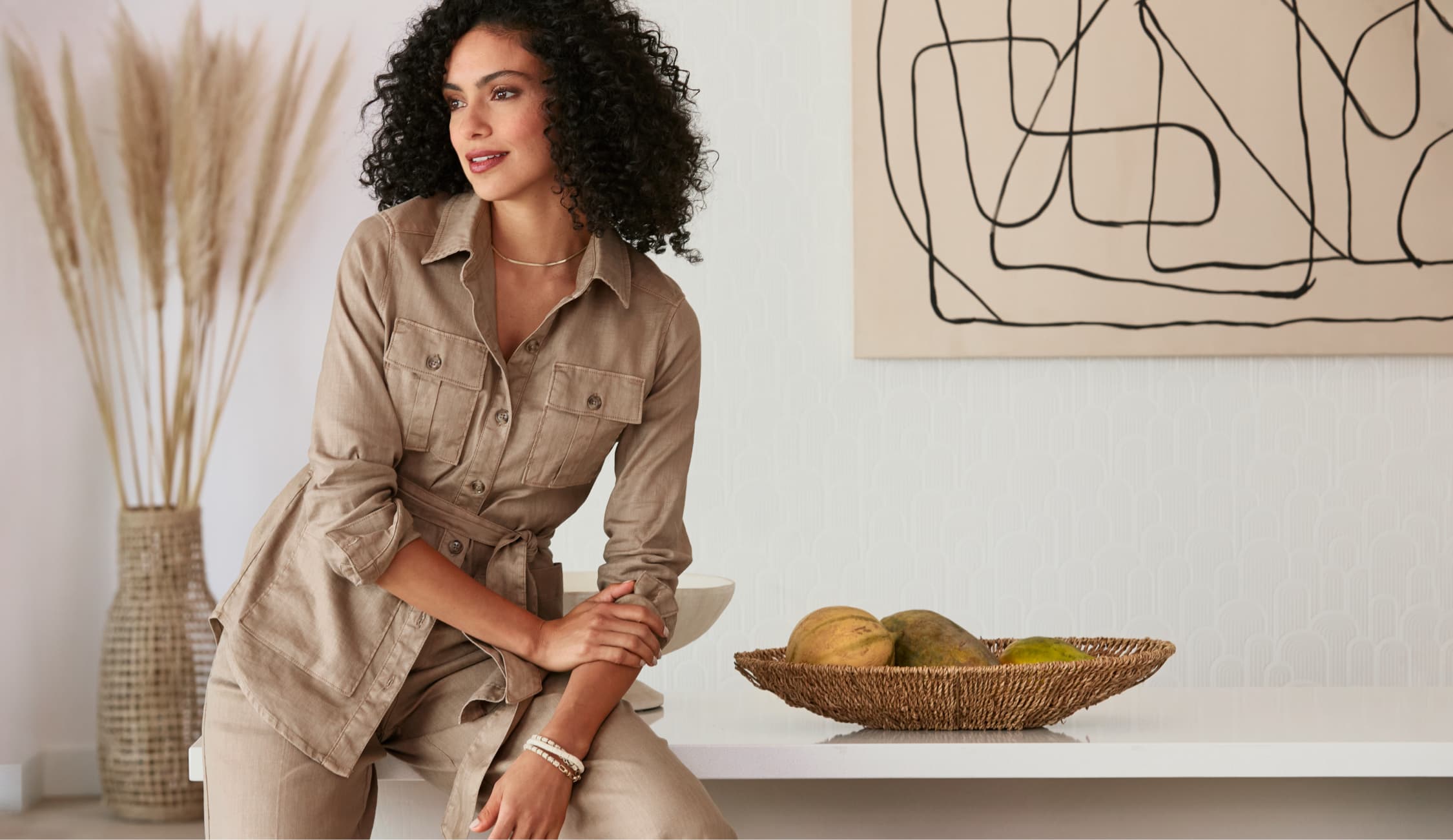 woman standing in living room.