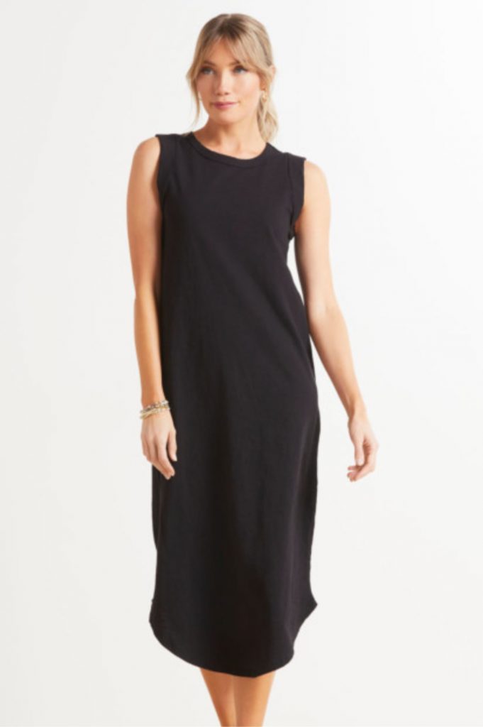 woman wearing black midi dress.